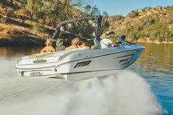 Click to Book Wake Boats FREE Now.. * Pay Nothing Now * Family Hauling in Wake Boat on the Lake * Bass Lake Boat Rentals