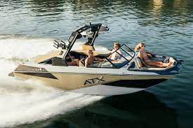 Reserve a Wake Surf Boat at Bass Lake Boat Rentals Family in Wake Boat on the Lake * Bass Lake Boat Rentals